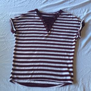 A girls maroon shirt from Justice